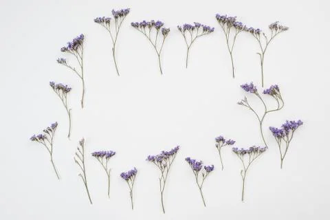 Frame made of  rustic flowers on table. Copy space Stock Photos