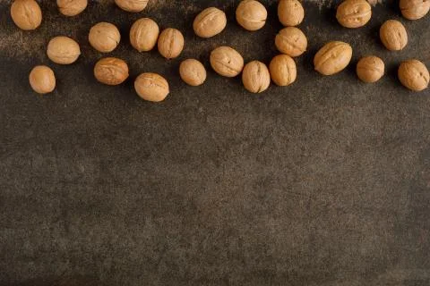 Frame made of walnut on stone background Stock Photos