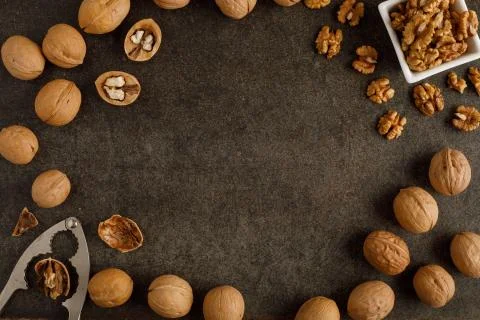 Frame made of walnut on stone background Stock Photos