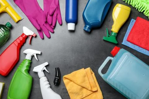 Frame of many different car cleaning products on dark background, flat lay... Stock Photos