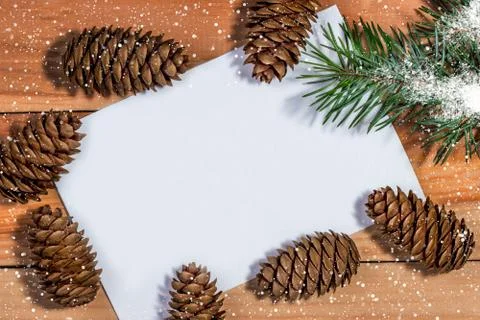 Frame of pine cones with space for text. Christmas Stock Photos