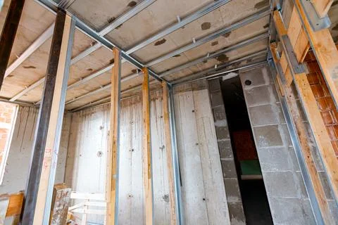 Frame for plasterboard wall, mounted vertical metal and wooden profiles Stock Photos