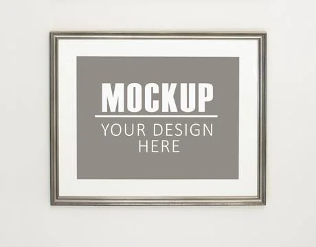 Frame, poster mock up. Empty gray picture frame hanging on the wall. Free spa Stock Photos