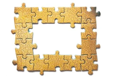 Frame of the puzzles on a white background Stock Photos