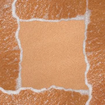 Frame from the sand and waves on the beach Stock Photos