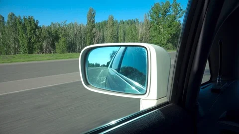 The frame in the side mirror of the car 動画素材 107686219