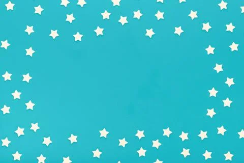 Frame of sprinkles over blue background, toned style Stock Photos