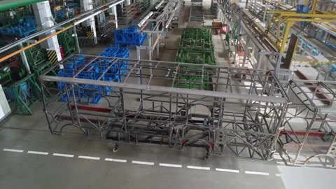 The frame structure of the bus in the assembly shop of the plant. Video stock 250086113