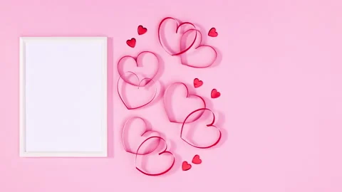 Frame for text appear next to romantic hearts decoration. Stop motion Vídeo Stock 146030331
