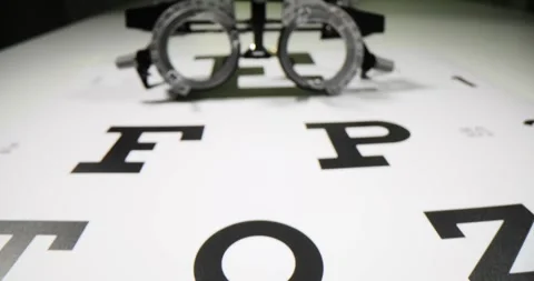 Frame for vision testing for diagnosis and selection of lens diopters Video stock 262411962
