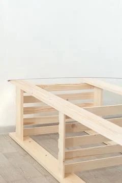 The frame of a wooden structure. Carpentry workshop Stock Photos