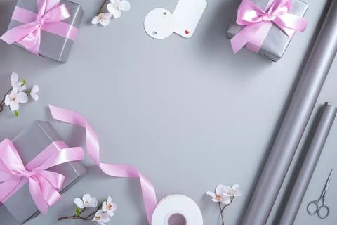 Frame of wrapping materials on light gray background. Copyspace. Stock Photos