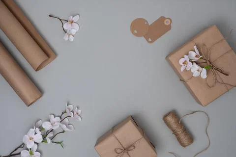 Frame of wrapping materials on light gray background. Stock Photos