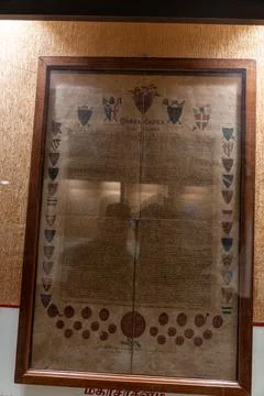 A framed document with a lot of writing on it. in Chennai Photos