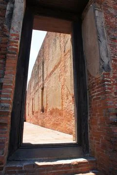 Framed Doorway in Temple Complex Surrounded by Brick Courtyards Stock Photos