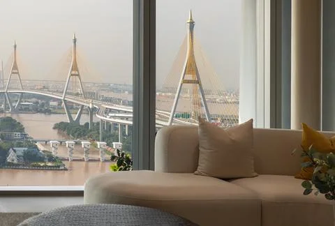 Framed by expansive windows that overlook the breathtaking Bhumibol Bridge .. 写真素材