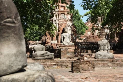 Framed front view Earth Touching Buddha in front of Prang Foto stock