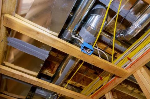 Framed residential home with basic rough pipe system of heating completed on  스톡 사진