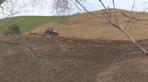 Framed view of field ploughing Stock Footage 40286359
