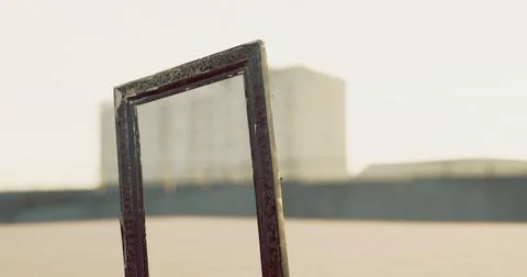 Framed view of urban landscape at sunset with modern buildings in background Ilustración de archivo