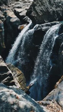 Framed water fall in the forest with high shutter speed Stockfoto's