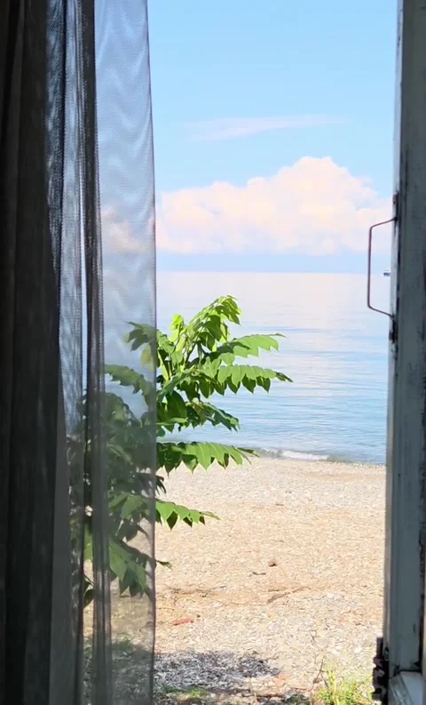 Framed Window View of Calm Beach Video stock 341630100