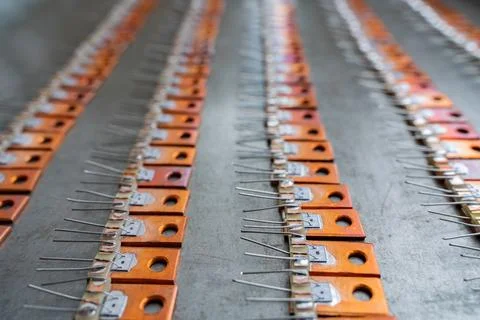 A frameless transistor for amplifying the current with a chip soldered Stock Photos