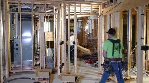Framers in Basement Stock Footage 123397325