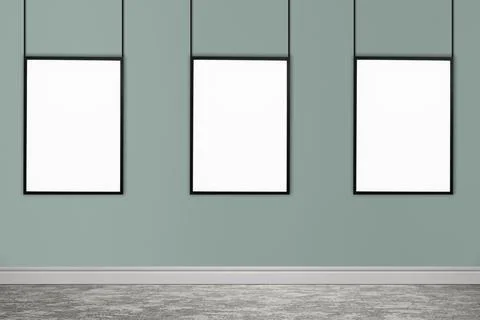 Frames with empty canvases on grey wall in modern art gallery. Space for desi Stock Photos