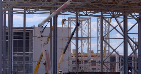 A frames made of metal beams against the background of a blue sky  Stock Footage 161985318