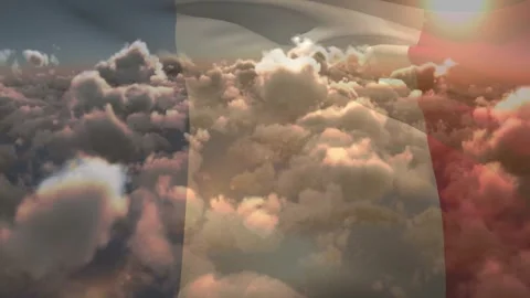 Frames opening revealing tricolor fabric rippling over cumulus sun flaring bird Stock Footage 330237149
