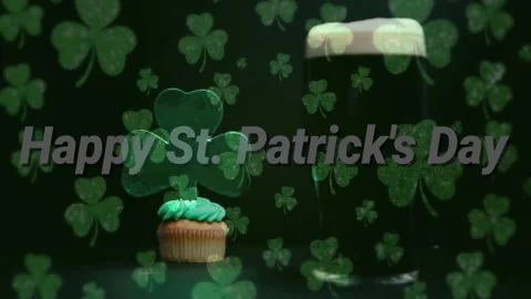 Frames starting, cupcake and pint glass moving, clovers drifting, Happy St Video stock 329472364