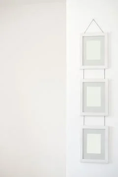 Frames on a white wall Stock Photos
