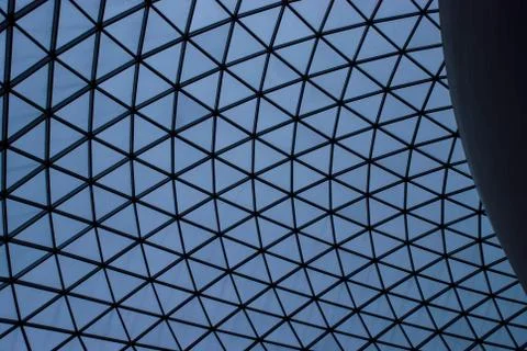 The framework of an interior glass ceiling in a public building in London, UK Stockfoto's
