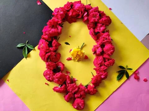 Framework from roses. One yellow rose surrounded by pink roses. Stock Photos