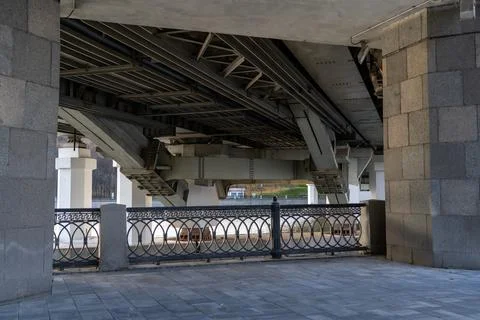 Framework under bridge. Metalwork. From the bottom of large bridge. Grey metal Stock Photos