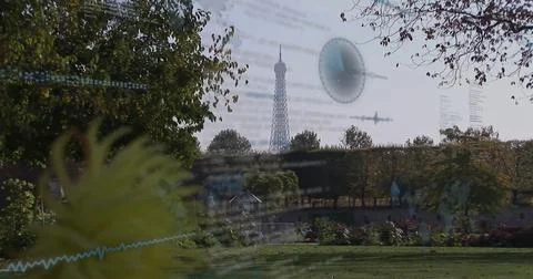 Framing centered Eiffel Tower highlighting public garden with benches, code 写真素材