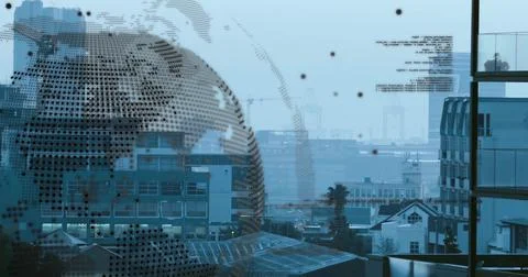 Framing decorative dotted globe decal filling center of glass window, revealing Stock Photos
