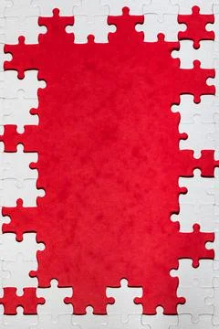 Framing in the form of a rectangle, made of a white jigsaw puzzle. Frame text Foto stock