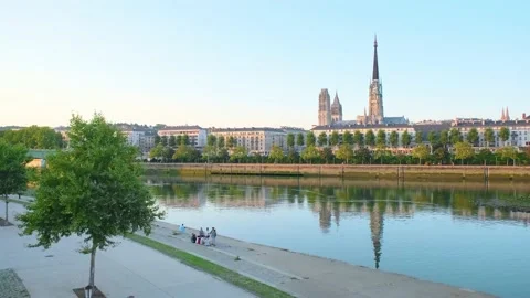 Framing of Rouen from the left side of the Seine river on sunset Stock Footage 140187256