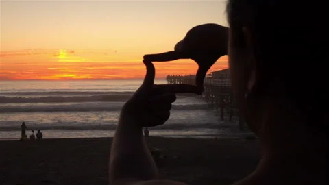 Framing sunset by the ocean in slow motion 250fps Stock Footage 111831367