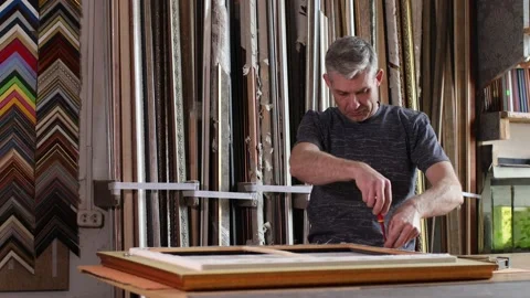 Framing Workshop. Making baguette handmade picture frame at studio Stock Footage 204029410