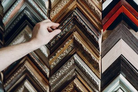 Framing Workshop. Making baguette handmade picture frame at studio Framing... Stock Photos