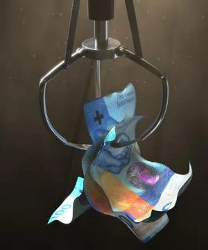 Franc Notes In A Robotic Claw Foto stock
