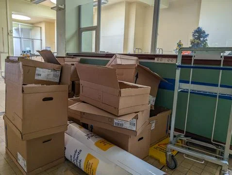 France, 13 July 2024: Stack of cardboard boxes and packaging materials in a.. Stock Photos