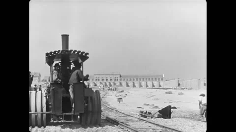 FRANCE - 1897 - A steamroller is used to equalize the ground alongside a Stock Footage 277281281