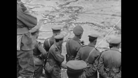 FRANCE - 1910s - Commanders look at a large relief map showing trenches. Stock Footage 327746451