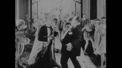 FRANCE - 1926 - In this silent comedy, drunk men try to play the drums at a Stock Footage 323221182