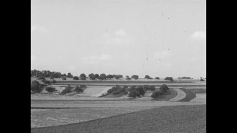 France 1940s:Open fields in the countryside. Map of Europe. Map of France. Stock Footage 248619973