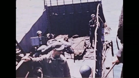 FRANCE - 1944: troops crowd the deck of a landing craft Stock Footage 340399959